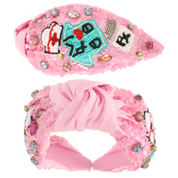 NURSE THEMED JEWELED TOP KNOTTED HEADBAND