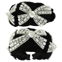 JEWELED BOW THEMED TOP KNOTTED HEADBAND